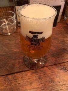 立って吞むおかだ