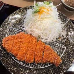 かつ哲中居店
