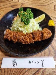 かつ善