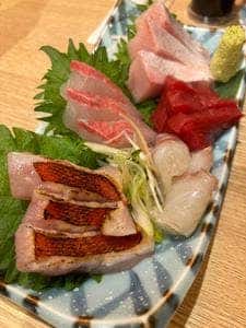 藁焼き小屋またふく 九条店
