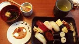 義つね