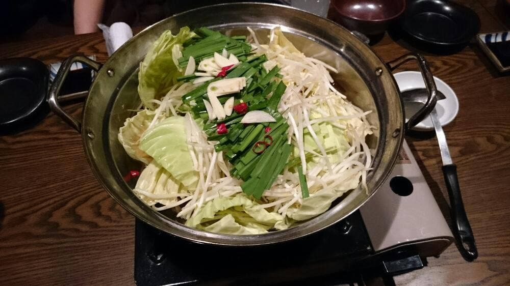万嵯九