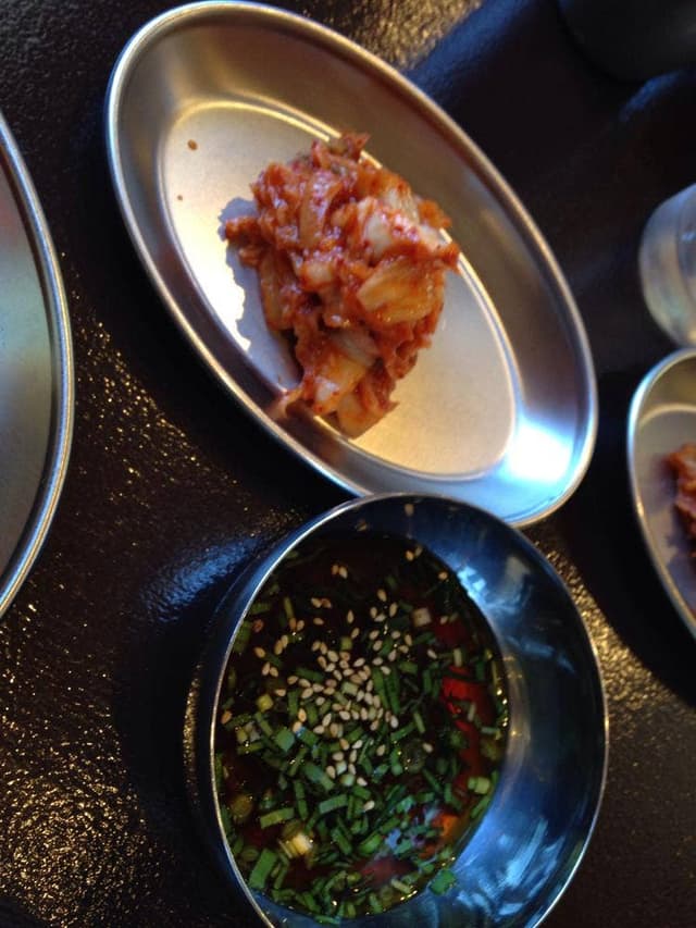 ドラム缶焼肉 骨付カルビ 新村 - サブ画像1