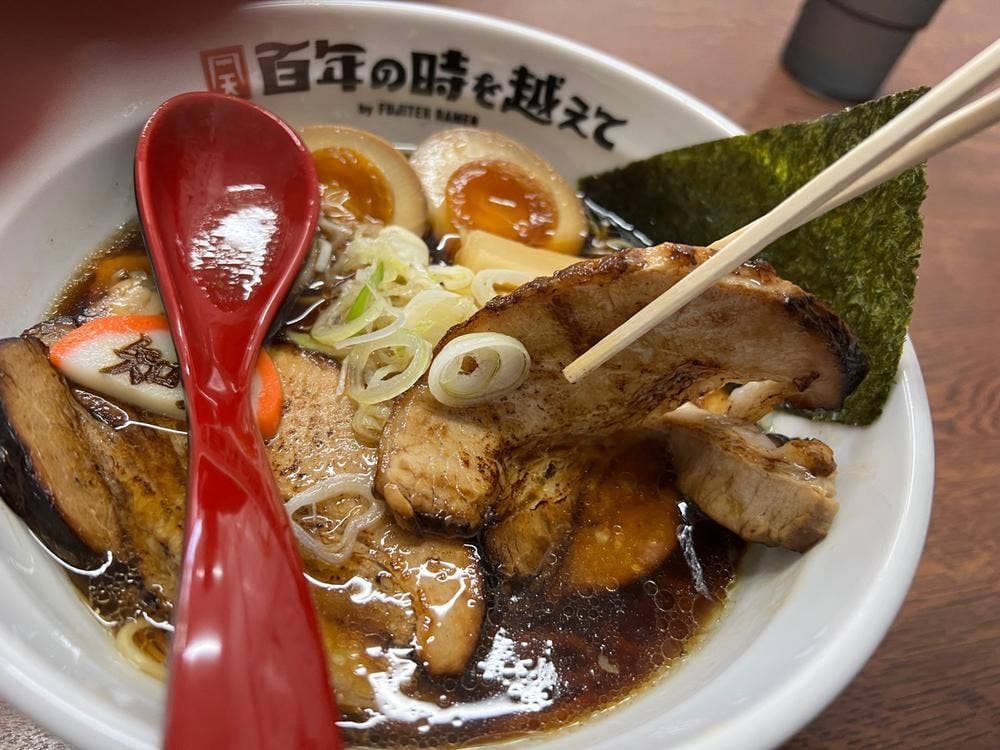 百年の時を越えて