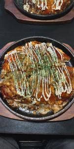 でめ金