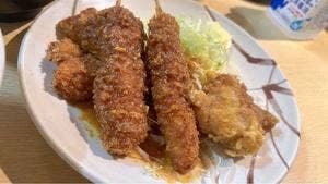 まる中