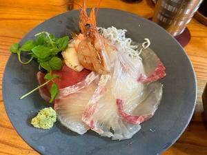 ま
