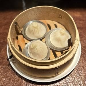 貢