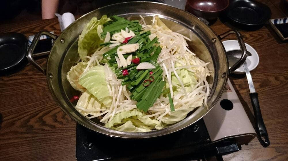 万嵯九