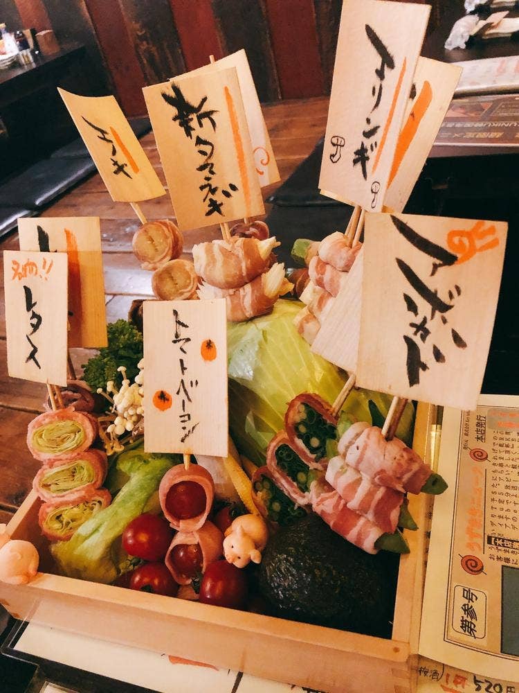 炭火野菜巻き串と餃子 博多うずまき 本店