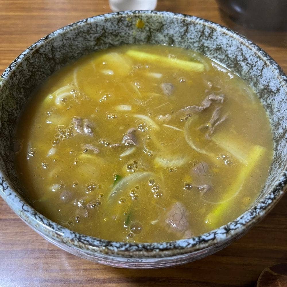 丸万