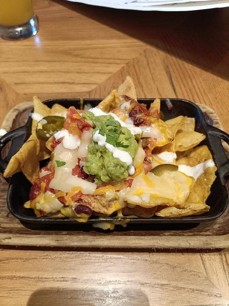 LAS DOS CARAS MODERN MEXICANO Y TACOS