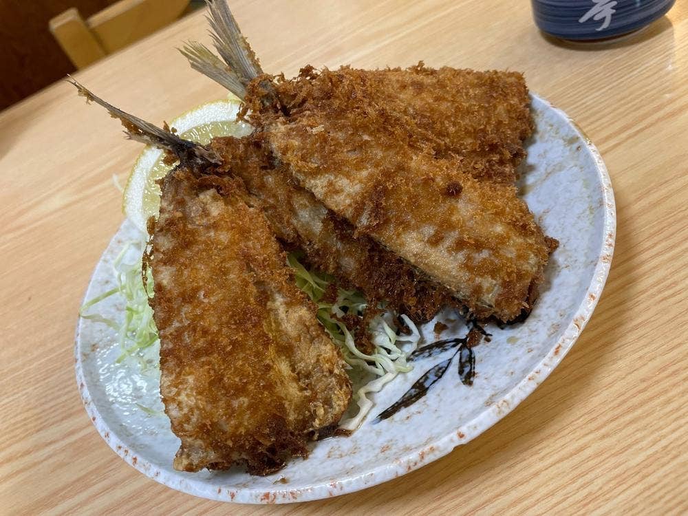 にし与