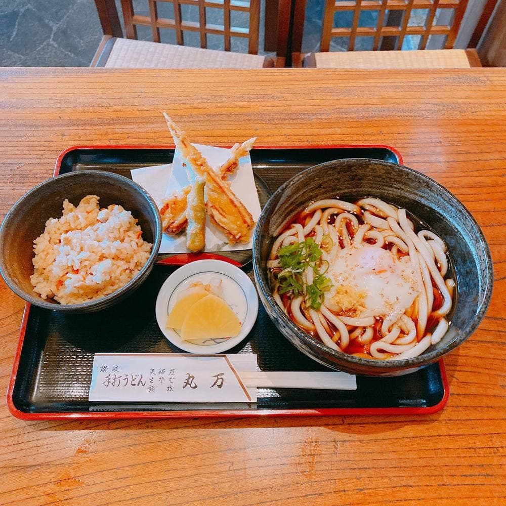 丸万