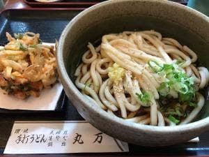 丸万