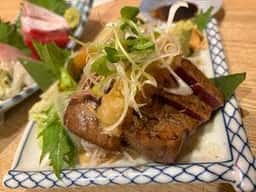 藁焼き小屋またふく 九条店
