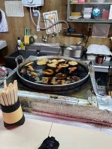 でん治